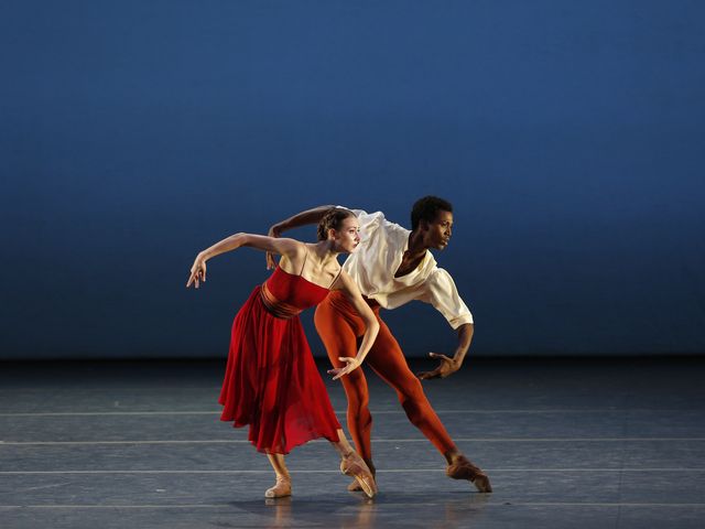 A man and a woman dancing ballet
